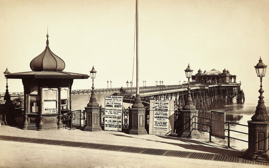 Victorian photograph of the original Pier with signage and events, for the pavilion | Image reproduced with permission of Hastings Museum and Art Gallery