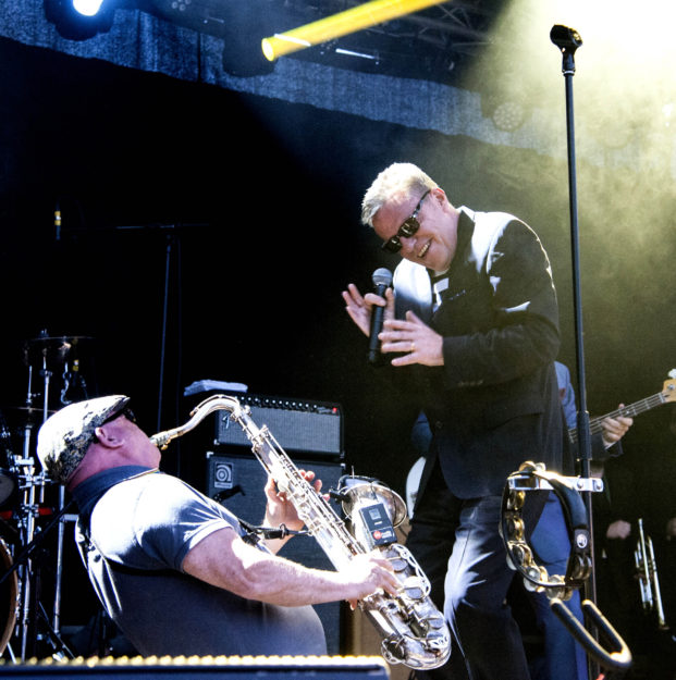 'Suggs' and saxophonist Lee Thompson on stage on the Pier. Suggs' the Madness lead singer was born in Hastings and said 
